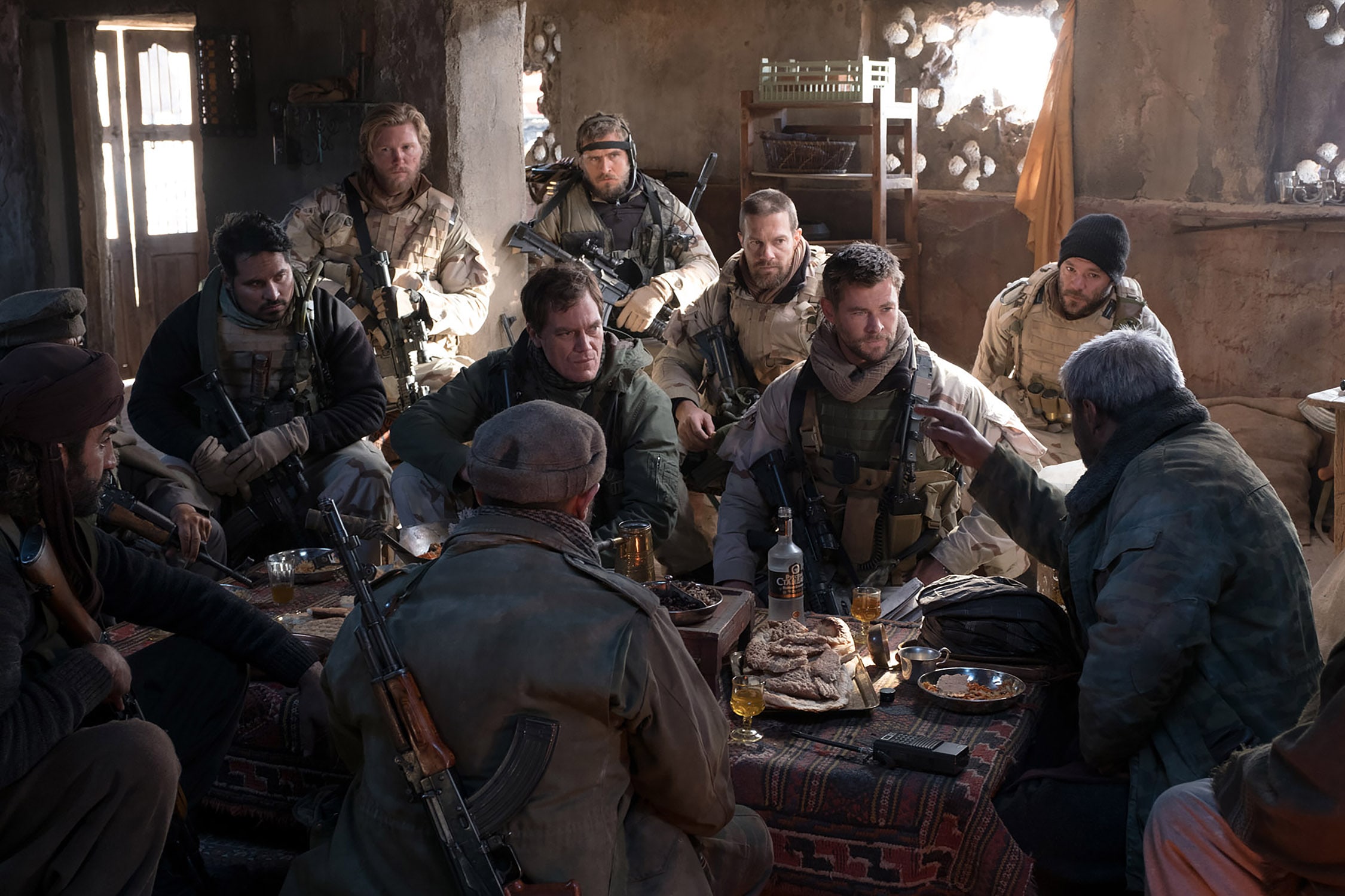 (L-r) MICHAEL PEÑA as Sam Diller, THAD LUCKINBILL as Vern Michaels, MICHAEL SHANNON as Cal Spencer, JACK KESY as Charles Jones, GEOFF STULTS as Sean Coffers, CHRIS HEMSWORTH as Captain Nelson and AUSTIN HÉBERT as Pat Essex in Jerry Bruckheimer Films’, Black Label Media’ and Alcon Entertainment’s war drama “12 STRONG,” a Warner Bros. Pictures release. Photo by David James